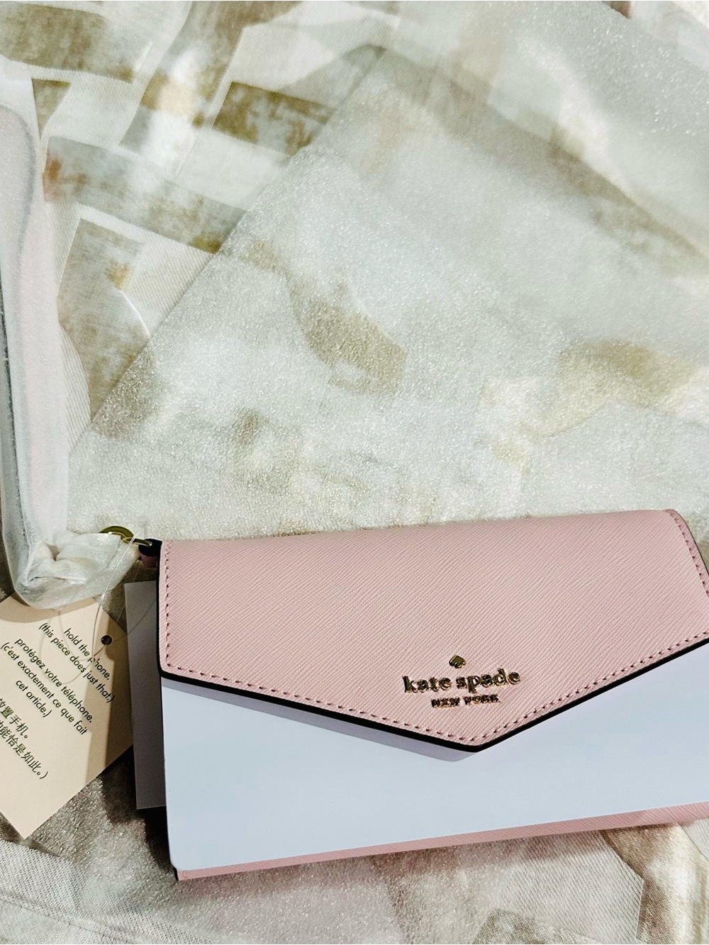 Kate Spade Laurel Way iPhone Wristlet in Chalk Pink